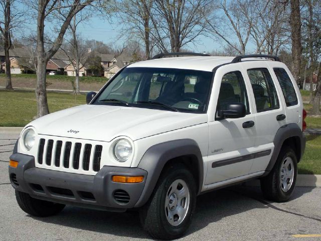 2004 JEEP LIBERTY SPORT 2WD white  all internet prices are reduced for cash cashiers check or