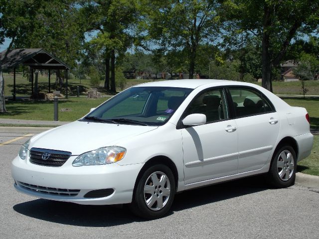 2007 TOYOTA COROLLA CE white  all internet prices are reduced for cash cashiers check or same