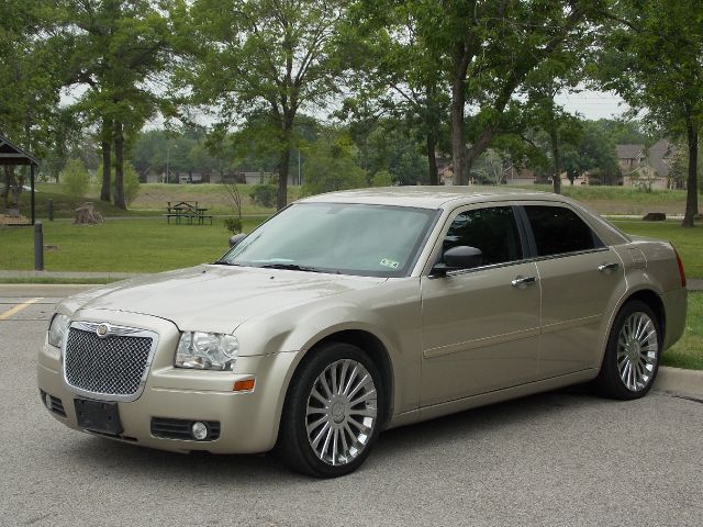 2006 CHRYSLER 300 BASE gold  all internet prices are reduced for cash cashiers check or same 