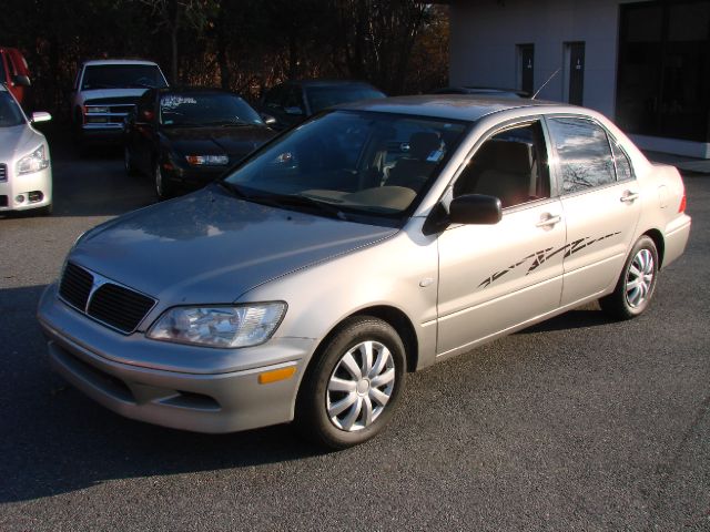 Tothego - 2003 Mitsubishi Lancer_1