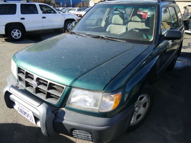 1999 SUBARU FORESTER L green 4wdawdabs brakesair conditioningamfm radioanti-brake system 4-