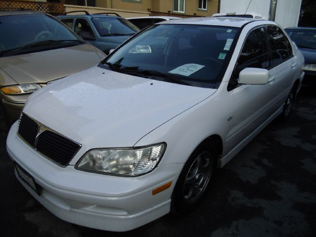 2002 MITSUBISHI LANCER OZ RALLY white 4 door front wheel drive cruise control power door locks