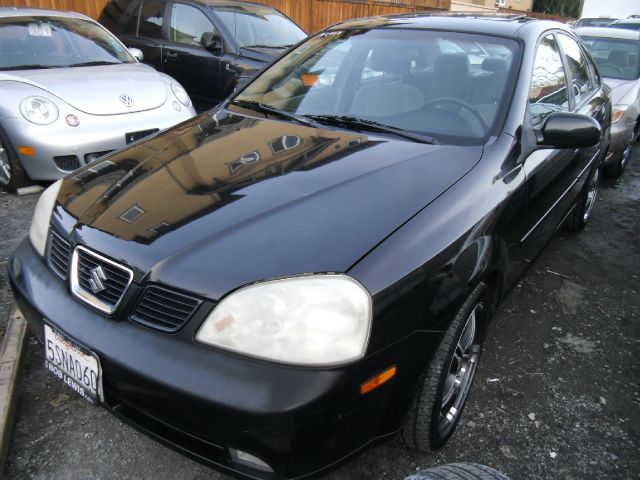 2004 SUZUKI FORENZA EX black air conditioningalloy wheelsamfm radioanti-brake system non-abs 