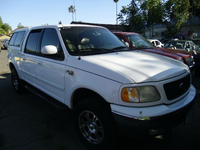 2001 FORD F150 LARIAT SUPERCREW 4WD white 4wdawdabs brakesair conditioningamfm radioanti-bra