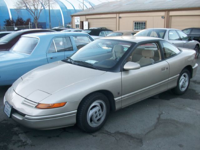 1994 SATURN S SERIES SC2, gold, ...