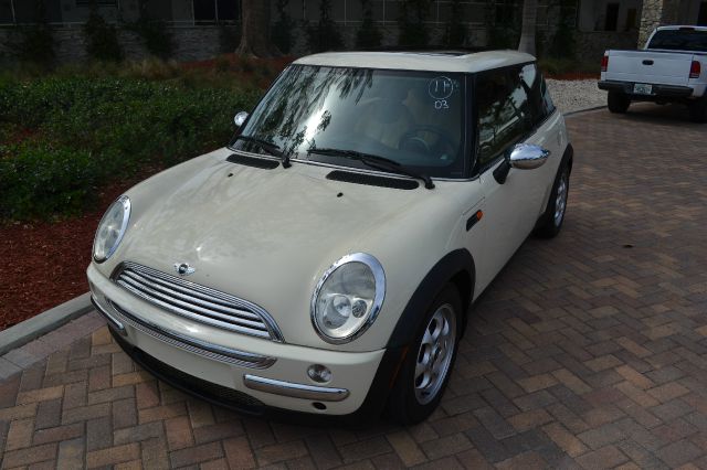 2003 MINI COOPER BASE cream we have financing available for all yours financial needs  you just c