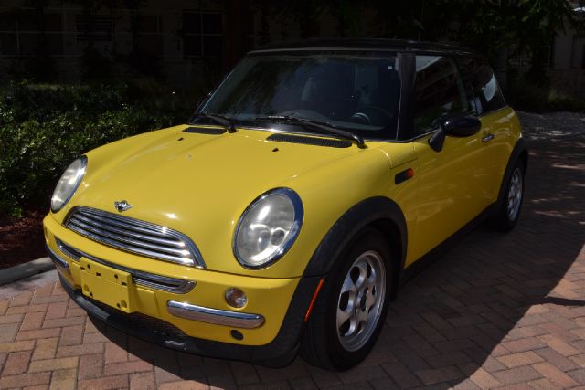 2004 MINI COOPER BASE yellow we have financing available for all yours financial needs  you just 