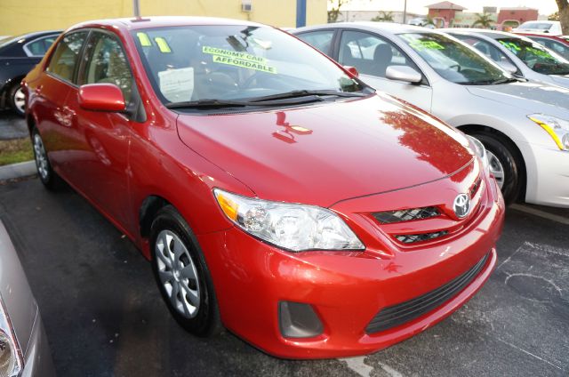 2011 TOYOTA COROLLA LE 4-SPEED AT barcelona red m abs brakesair conditioningamfm radiocd playe