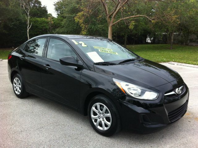 2012 HYUNDAI ACCENT GLS 4-DOOR ultra black pearl call now 1-866-717-9571   free autocheck  carfa