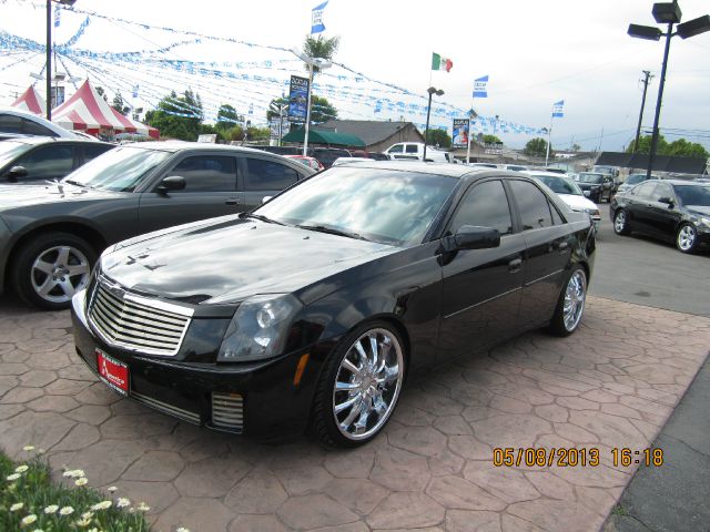 2004 CADILLAC CTS BASE black abs brakesair conditioningalloy wheelsamfm radioanti-brake syste